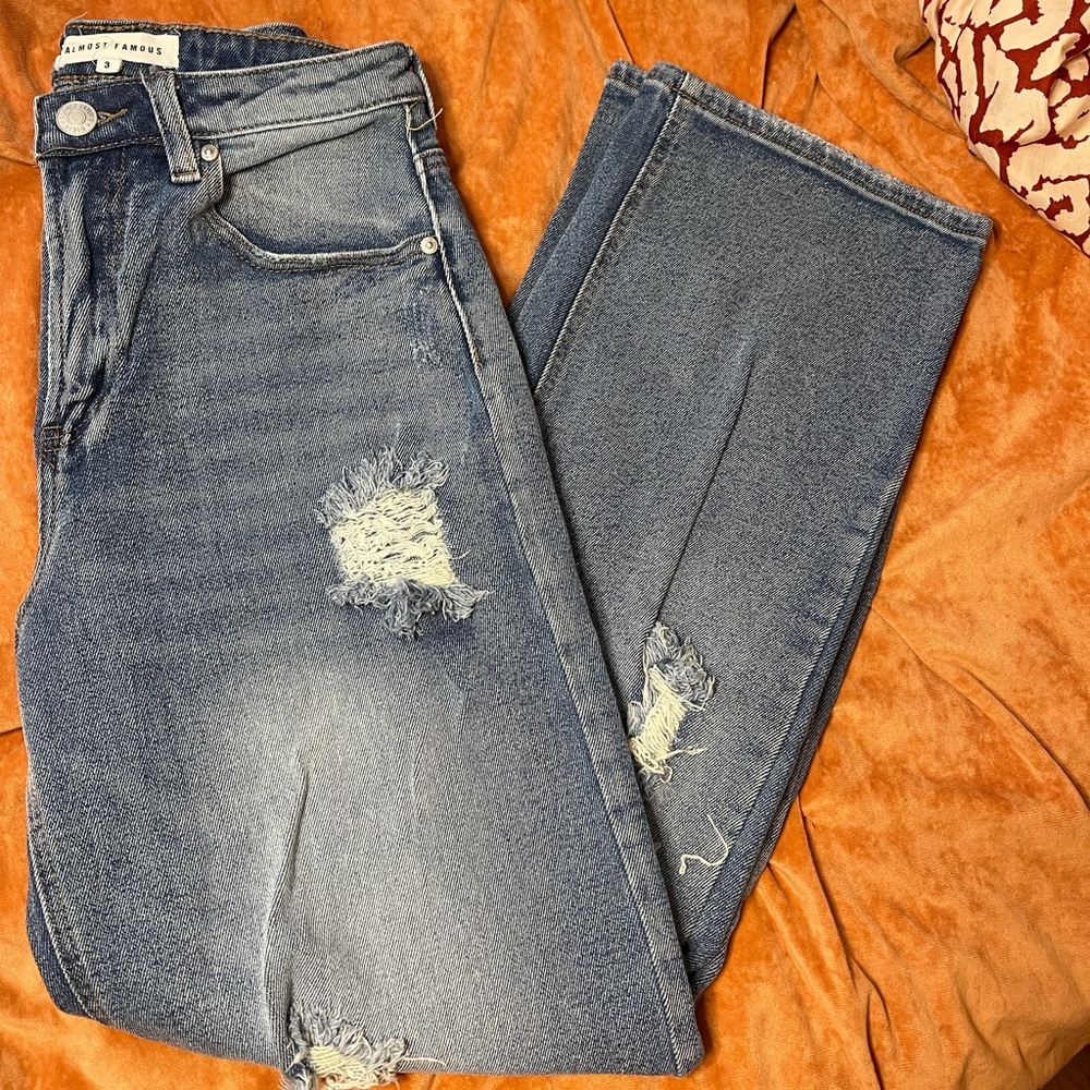 Distressed Medium Wash Jeans Size 3. Brand: Almost Famous. NEVER WORN!!